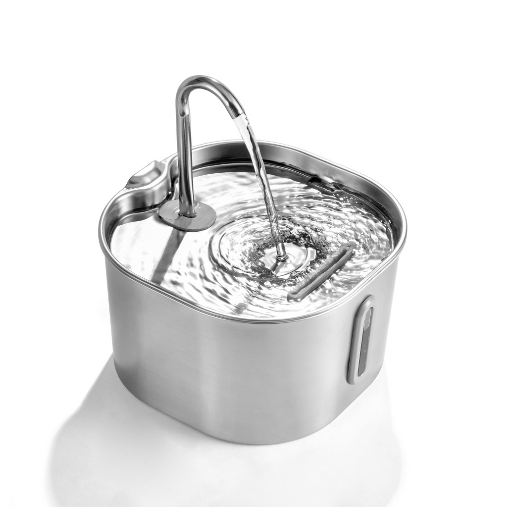 A stainless steel water fountain with a curved faucet and clear water flowing into a square basin, shown on a clean white background.